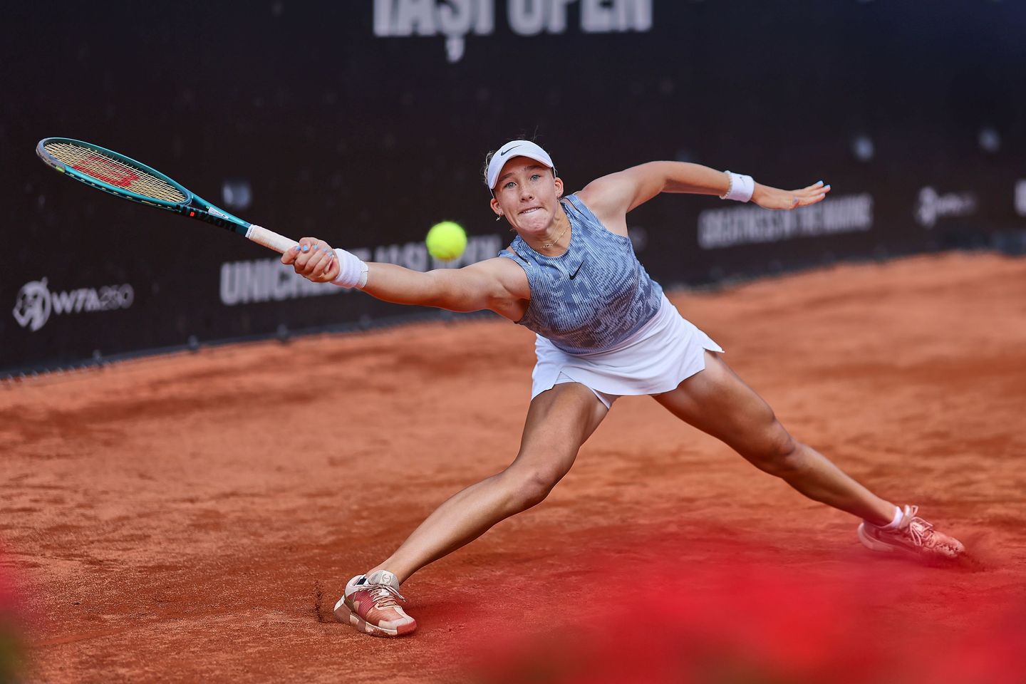 Mirra Andreeva saved two match points trailing Olga Danilovic 5-2 in the third set of their Iasi semifinal, pulling through 3-6, 6-3, 7-6(1) to reach her first WTA final.