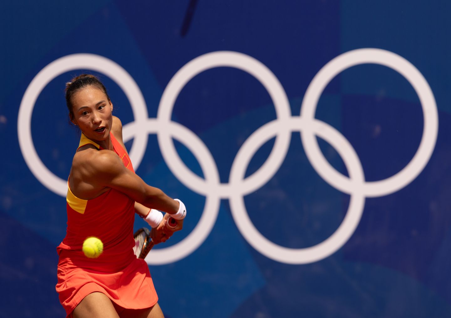 Zheng Qinwen saved one match point down 5-3 in the second set before rallying for a 6-7(7), 7-6(4), 6-1 victory over Emma Navarro in the Round of 16 of the 2024 Paris Olympics.