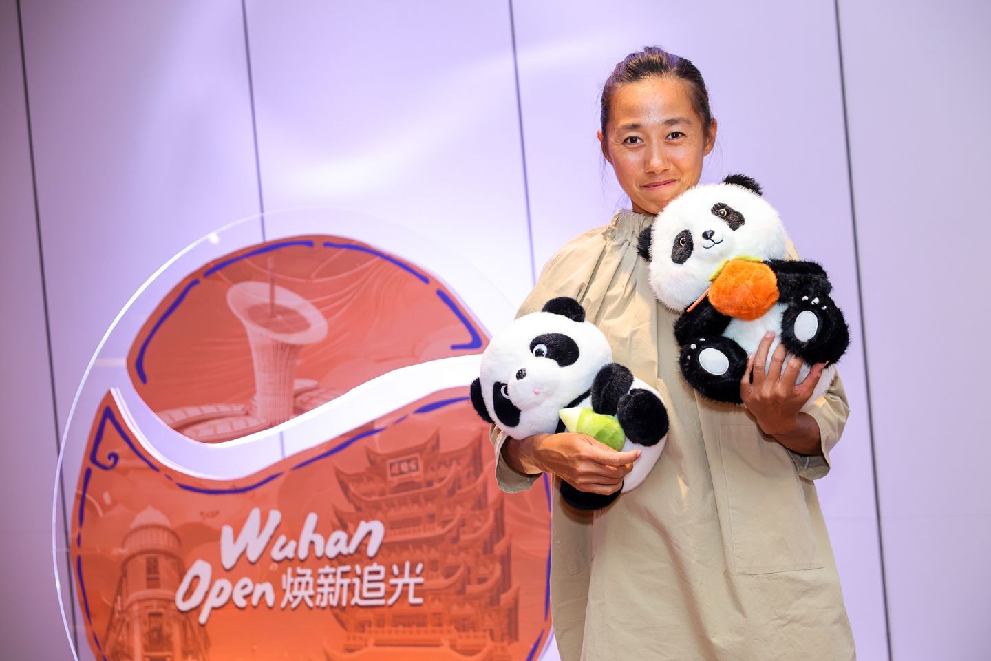 Zhang Shuai, fresh off a quarterfinal effort in Beijing, attended the party with some fluffy friends.