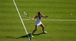 Marta Kostyuk escaped Daria Saville in the Wimbledon second round from 5-2 down in the second set, saving one match point as the Australian served at 6-5.