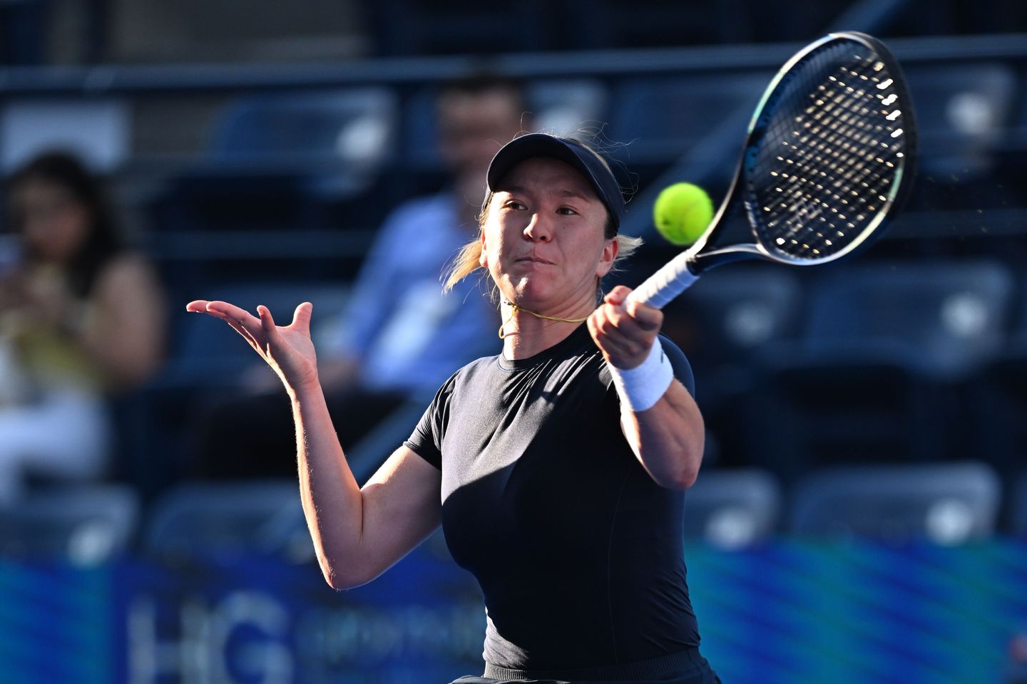 Lulu Sun came from 4-1 down in the third set, saving one match point trailing 5-4 on serve, to defeat Maria Lourdes Carle 6-3, 2-6, 7-6(2) in the second round of Monterrey.